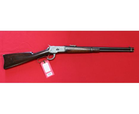 A Winchester model 1892 lever action saddle-ring carbine in 44-40 cal, S/No.893171 c1919, standard 20" round barrel with corr