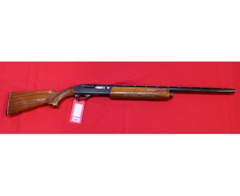 A Remington 1100 12 bore self loading shotgun, S/No.M-788091-V, in original box of purchase, in overall very good and clean c