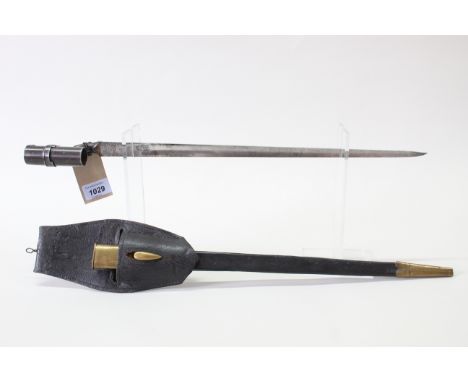 A British model 1853 socket bayonet with brass mounted scabbard and leather frog