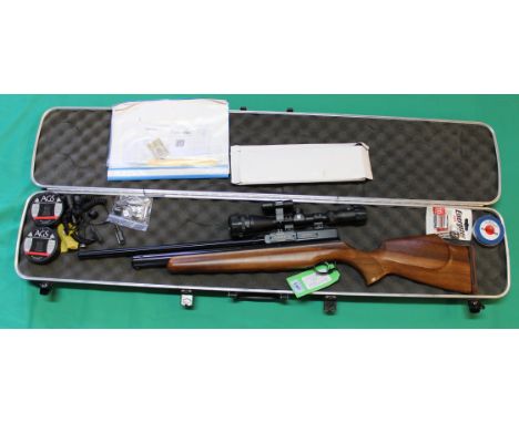 A Webley &amp; Scott Raider-10 P.C.P. air rifle in .177 cal, complete with Nikko Stirling 3-9x40 scope and mounted light with