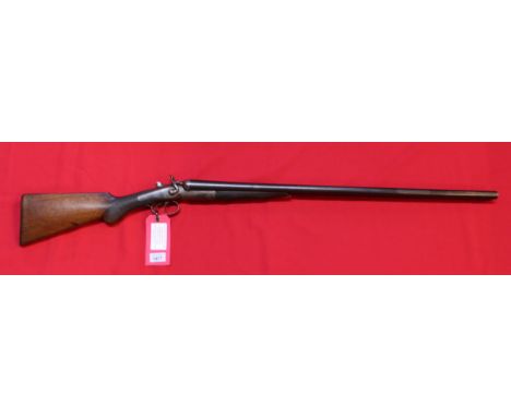 A 12 bore double barrel (hammer) shotgun by T Wild Birmingham, N.B. this classic English hammer gun is black powder proof onl