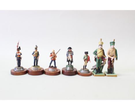 Seven military themed ceramic/cast figures