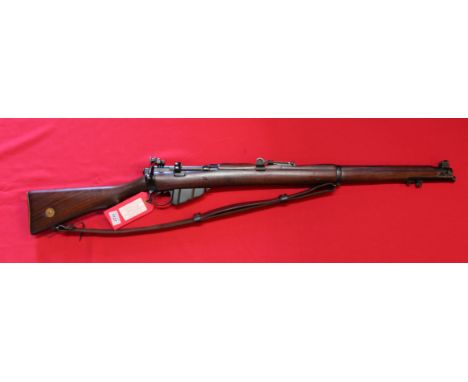 An S.M.L.E. by B.S.A. Co in .22 rim fire cal, S/No.A92913, with action marked G.R. under crown B.S.A Co SMT22 IV, this very f