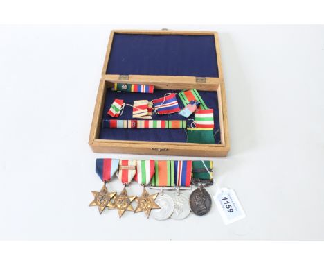 A WWII group 1939/45 star, Africa Star with 8th Army clasp, the Italy Star with War and Defence medals, also included with th