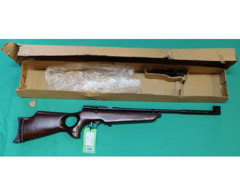 An A.R. 2078 bolt action CO2 air rifle with thumb hold stock and 'peep' rear sight, in original box and 'as new' condition, a