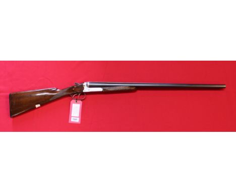 A 12 bore B.L.E. shotgun by 'Victoria' with 28" barrels, S/No.99203 (N.B. interesting detachable ejector system), this item c