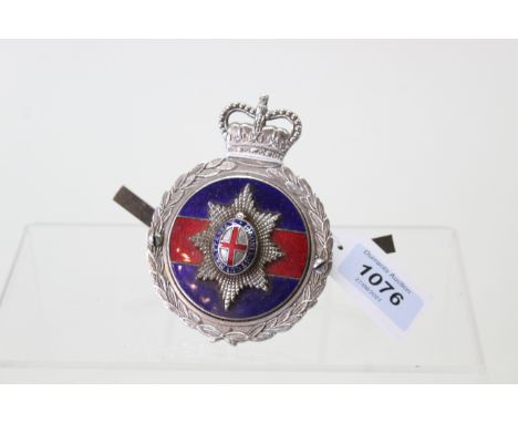 A Coldstream Guards enamelled car badge by J R Gaunt