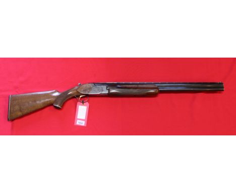 A 12 bore over/under shotgun by Miroku, S/No.612758 with 26" barrels and fine bores, box-lock ejector with single trigger, in