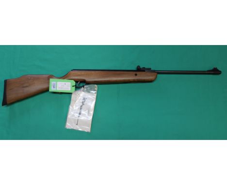 An SMK 19-18 break barrel .22 cal air rifle in excellent condition, as a post 1939 air weapon the restrictions of the Crime R