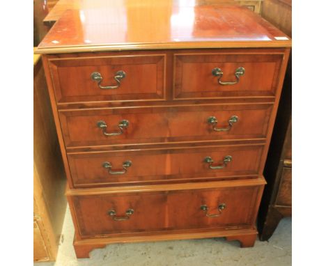 Reproduction yew wood TV unit with dummy drawers on bracket feet.