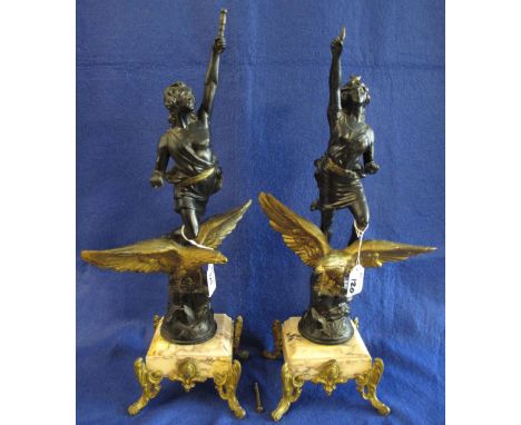 Pair of bronzed spelter figural clock supporters with foliate metal mounted marble bases in the French style. (2)