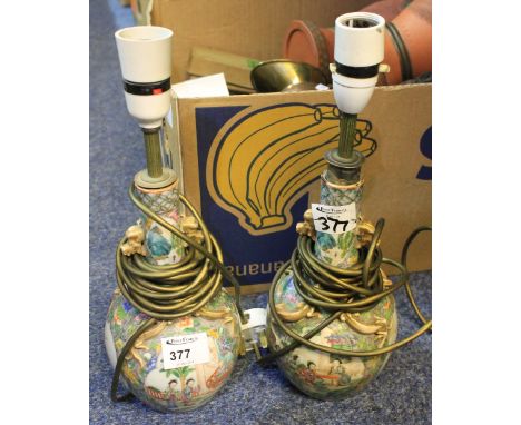 Pair of Chinese Canton porcelain vases now converted to lamp bases, decorated with figural panels. Unmarked. (2) CONDITION RE