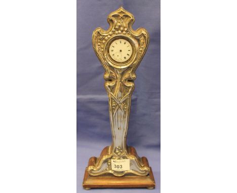 Silver Art Nouveau design mantel clock with wooden long case body, raised on three bun feet, overall repousse decorated with 