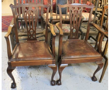 Pair of mahogany, Chippendale style, elbow chairs on cabriole legs and ball and claw feet. (2)
