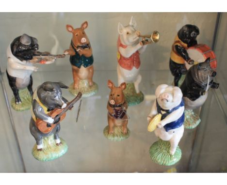 Collection of assorted Beswick animal figures to include: 'Christopher playing the guitar'; 'Daniel playing the violin'; 'Mic