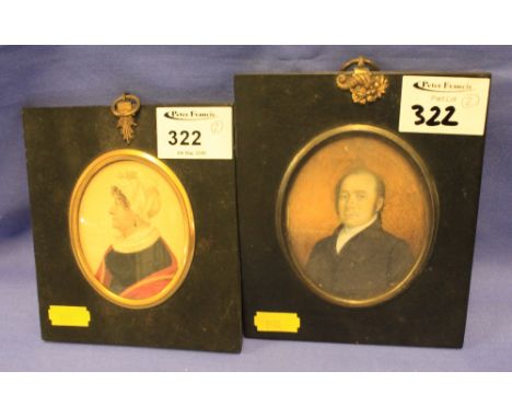 Two 19th Century portrait miniatures, lady and gentleman, painted.  Ebonised frames with gilt mounts. (2)
