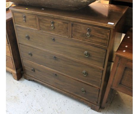 19th Century mahogany inlaid straight front chest of three short and three long drawers with ring handles on bracket feet.