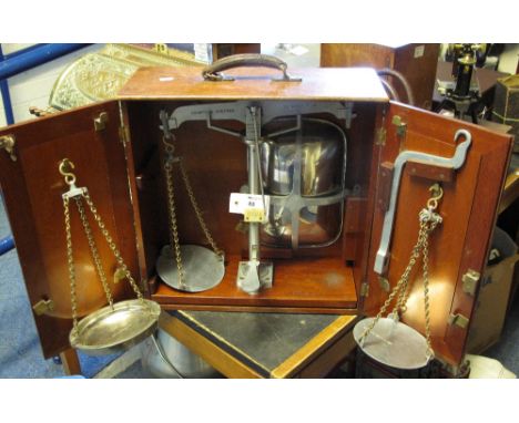 A cased set of De Grave of London Weights and Measures Department portable scales, in fitted mahogany case, marked: 'County o