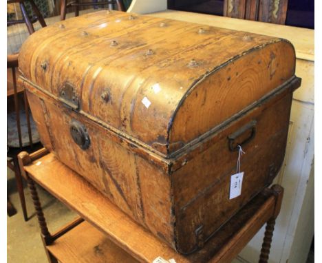 Vintage tin trunk with carrying handles.