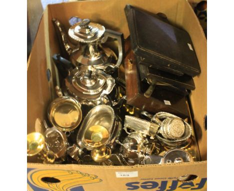 Box of assorted metalware to include: cased spoons and forks etc.; silver plated tea service; brass nutcracker; candlesticks 