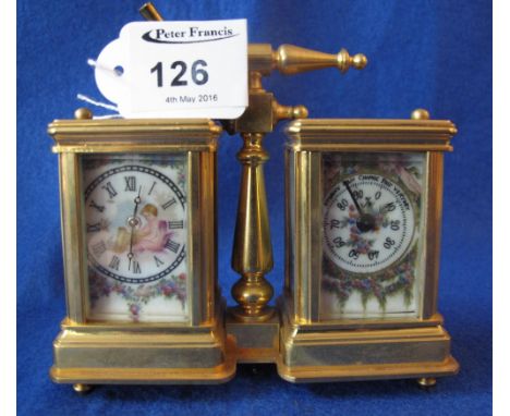 Small brass double carriage clock and barometer with painted porcelain panels.