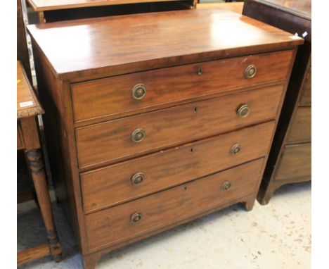 19th Century mahogany straight front chest of four drawers with ring turned handles on bracket feet.