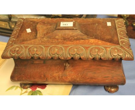 19th Century carved, sarcophagus shaped, tea caddy with fitted three sectioned interior.
