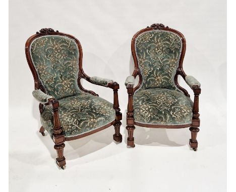 Pair of Victorian mahogany armchairs&nbsp;with pierced and carved acanthus leaf finials, button backs, each 103cm high&nbsp;