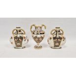 Davenport Longport Imari-pattern garniture of three vases, mid-19th century, printed iron red marks,