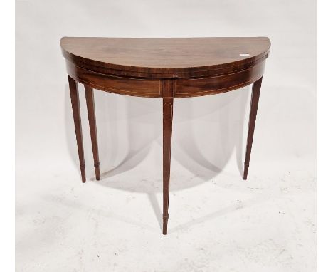 Victorian mahogany folding card table&nbsp;of demi-lune form, opening to reveal a green baize top, raised on square tapering 