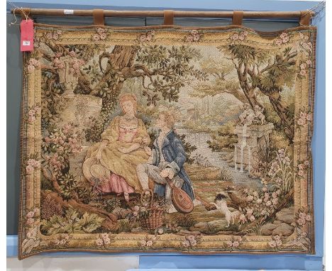 Modern machine made hanging tapestry&nbsp;showing a young man kneeling before a young woman, with a spaniel barking in the fo