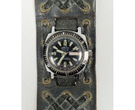 Prestige 17 jewel automatic diver's style wristwatch, the black dial with baton hour markers, Arabic quarter hour and day dat