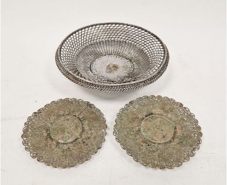 20th century white metal silvered wirework circular footed basket of basket form, woven with interlocking wirework within rop