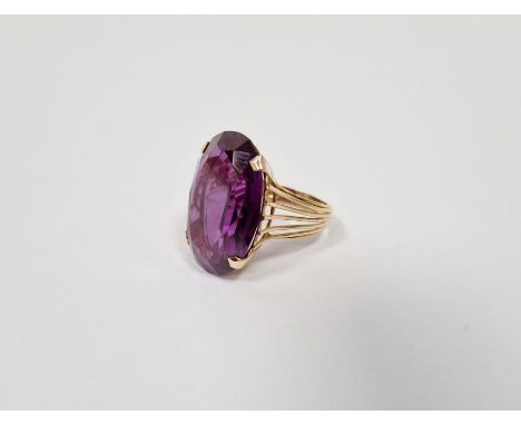 Gold-coloured metal and large amethyst-coloured stone ring set single oval faceted stone (marked possibly French)    Conditio