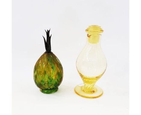 Mid-century Scandinavian yellow-tinted glass cocktail shaker and stopper, of baluster form, on wrythen stem and spreading foo