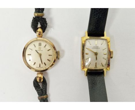 Mid-century lady's Omega wristwatch, housed in an 18ct gold case, the circular dial with baton hour markers, together with a 