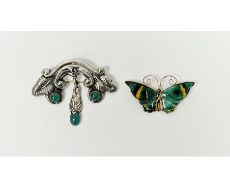 David Andersen, Norway sterling and enamel butterfly brooch and 830 metal and green stone brooch, scroll design with central 