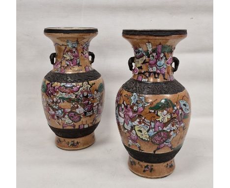 Pair Chinese Late Qing Dynasty crackle glaze oviform vases, moulded and enamelled with warriors on horseback, within moulded 
