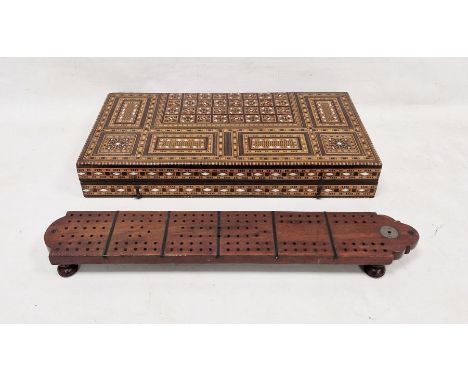 Middle Eastern intricately inlaid folding backgammon board, 50cm x 25cm x 18cm folded and an unusual large hardwood cribbage 