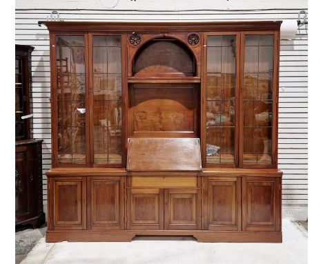 Edwardian mahogany library bookcase&nbsp;having moulded cornice, the central section rosette carved with arcaded open shelf a