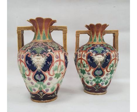 Pair of Copeland majolica two-handled oviform vases, late 19th century, impressed marks, with pierced square handles and moul