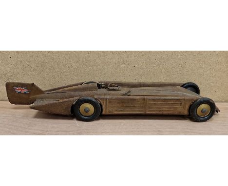Kingsbury Golden Arrow clockwork tinplate landspeed record car with Uk flags to tail