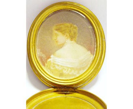 19th century portrait miniature, head and shoulders portrait of a lady in pearl earrings, oval, 4.5cm x 4cm in gilt metal and