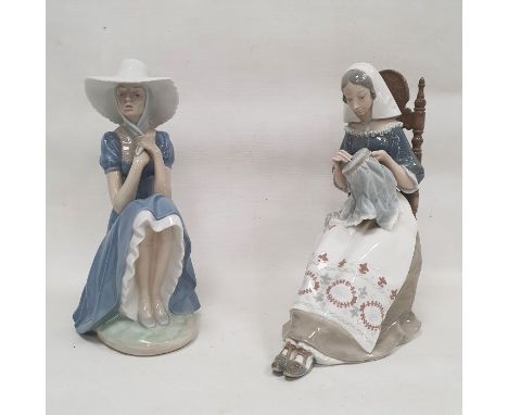 Lladro figure&nbsp;of 'The Embroiderer', modelled seated on a chair embroidering, 27cm high and a Nao figure&nbsp;of a seated