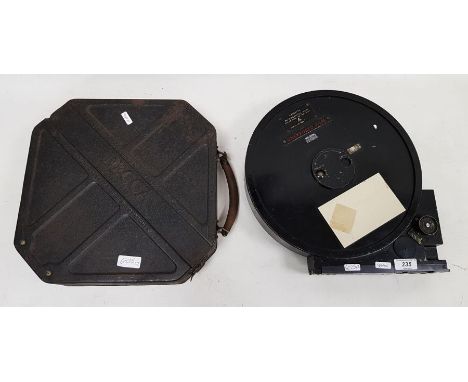 Military photographic film cassette Cat. No. 6730-99-914-4797, serial number 309 with broad arrow mark 31cm diameter and an u