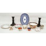 Pair of Wedgwood black basalt candlesticks, moulded with classical figures including Venus and