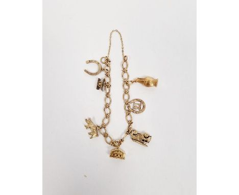 9ct gold charm bracelet, the oval and cross link bracelet with multiple gold and gold-coloured charms, to include Swiss chale