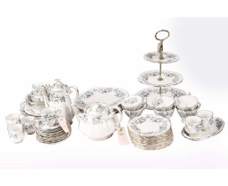 A Royal Albert ‘Silver Maple’ pattern part tea and dinner service, including: a three tier cake stand, a coffee pot, a tea po