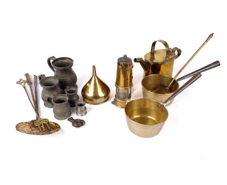 A selection of brass and pewter ware, including: a brass watering can, with hinged lid, 25cms high; five graduated pewter tan