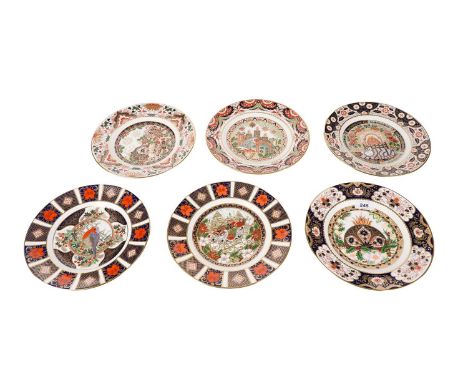 A collection of Royal Crown Derby limited edition decorative Christmas plates, each decorated in the ‘Imari’ palette, includi